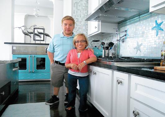 The couple's custom-built house features a stunning kitchen that is a perfect fit